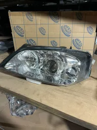 FAROL ESQUERDO ASTRA 03 A 11 CROMADO NOVO PARALELO