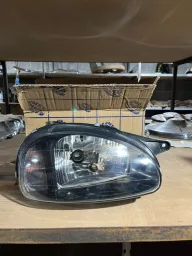 FAROL DIREITO CORSA 2000 A 2010 LENTE LISA MASC PT