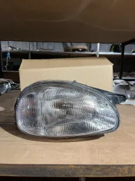 FAROL DIREITO CORSA 1995 A 1999 CARC PT NOVO