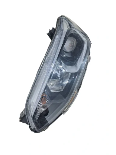 Farol esquerdo tracker 2020 2021 a 2025 s/ led com detalhe
