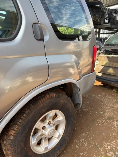 Lateral traseira esquerda XTerra 2003 a 2007 C/Detalhe