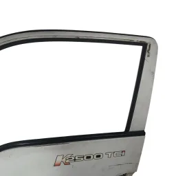 PORTA DIANTEIRA ESQUERDA KIA BONGO 2006 A 2024 ORIGINAL
