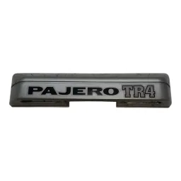 MOLDURA LUZ PLACA MITSUBISHI PAJERO TR4 2003 A 2009 DETALHE