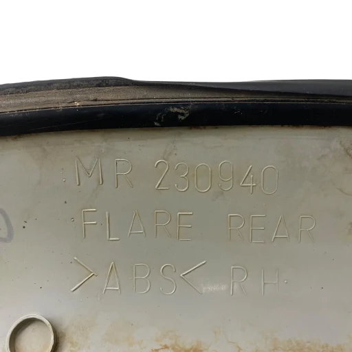 ALARGADOR RODA TRASEIRA DIREITA PAJERO SPORT 1999 A 2006 DET MR230940