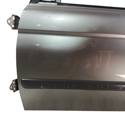PORTA DIANTEIRA ESQUERDA PAJERO SPORT 99/11 L200 04/11