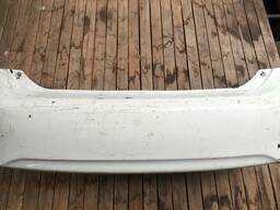 PARACHOQUE TRASEIRO COMPLETO COROLLA 09 A 11 BRANCO DETALHE