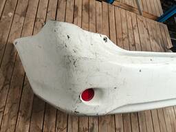 PARACHOQUE TRASEIRO COMPLETO COROLLA 09 A 11 BRANCO DETALHE