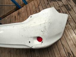 PARACHOQUE TRASEIRO COMPLETO COROLLA 09 A 11 BRANCO DETALHE