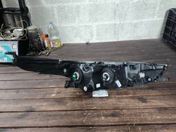 FAROL CROMADO SEM LED YARIS 2019 A 2025 ESQUERDO RECUPERADO