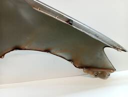 PARALAMA ESQUERDO HILUX 2006 2007 A 2011 S/ FURO MOLDURA