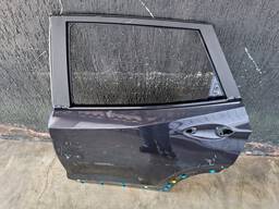 PORTA TRASEIRA ESQUERDA TRACKER 2020 2022/.. C/DETALHE