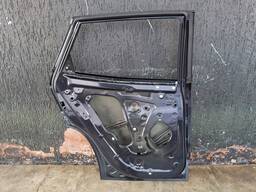 PORTA TRASEIRA ESQUERDA TRACKER 2020 2022/.. C/DETALHE