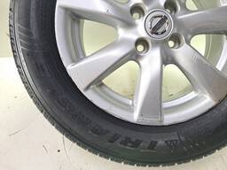 RODA LIGA LEVE ARO 15 NISSAN VERSA C/PNEU 185/65/15