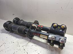 PAR AMORTECEDORES DIANTEIRO VERSA 2012 2013 A 2020