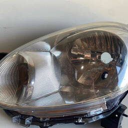 FAROL ESQUERDO NISSAN MARCH 2012 A 2014 ORIGINAL