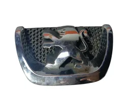 Emblema Parachoque Peugeot 207 / 9687111777 Detalhes