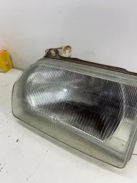 FAROL LADO ESQUERDO APOLO ESCORT VERONA GLX  1989/1992