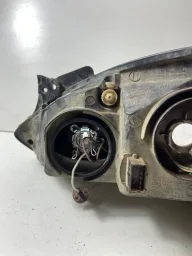 FAROL LADO ESQUERDO CORSA 2002/2012