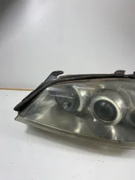 FAROL LADO ESQUERDO ASTRA 1998/2002