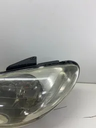 FAROL LADO ESQUERDO 206 2003/2008