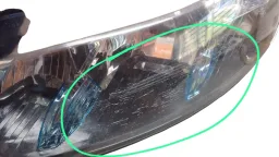 FAROL ESQUERDO STILO 2003 A 2011 DETALHE