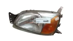 FAROL ESQUERDO FIESTA 2000/2002 COURIER 00/13 PISCA LARANJA