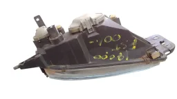 FAROL ESQUERDO FIESTA 2000/2002 COURIER 00/13 PISCA LARANJA