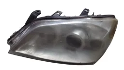 FAROL ESQUERDO ASTRA 2003 2004 A 2011
