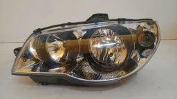 Farol Esq. Palio G3 04/17 Siena 05/12 Cromado, canhão preto