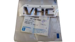EMBLEMA TRASEIRO VHC CELTA CORSA 07/12