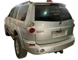 BOTÃO VIDRO TRASEIRO ESQUERDO MITSUBISHI PAJERO SPORT 10