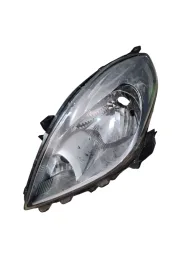 FAROL ESQUERDO VERSA 2012 2013 A 2014 (DETALHE)