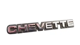 EMBLEMA TAMPA TRASEIRA GM CHEVETTE (FERRO) 1980/1986
