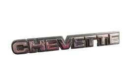 Emblema tampa traseira GM Chevette (ferro) 1980/1986