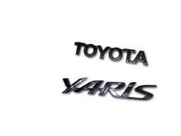 EMBLEMA TAMPA TRASEIRA TOYOTA YARIS 2007