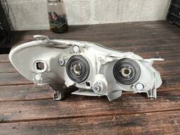 FAROL MASC NEGRA + FOCO CROMADO COROLLA 2003 A 2008 ESQUERDO