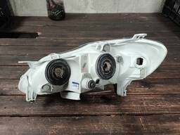 FAROL MASCARA NEGRA COROLLA 2003 2004 A 2007 2008 DIREITO