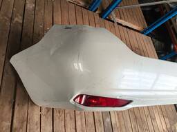 PARACHOQUE TRASEIRO YARIS SEDAN 2019 A 2025 BRANCO DETALHE