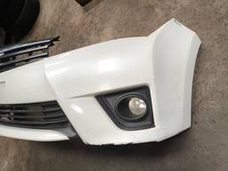 PARACHOQUE DIANTEIRO COMPLETO COROLLA 15 A 17 BRANCO DETALHE