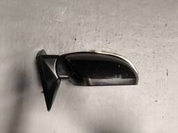 RETROVISOR DIR TUCSON 2009 A 12 PRETO C/PISCA 7PINOS DETALHE