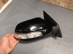 RETROVISOR DIR TUCSON 2009 A 12 PRETO C/PISCA 7PINOS DETALHE