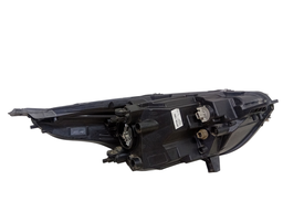 FAROL ESQUERDO KA 2018 A 2021 MASC NEGRA  (DETALHE)