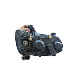 FAROL ESQUERDO SONIC 2012 A 2014 ARO PRETO