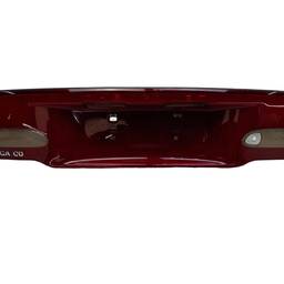 LANTERNA TAMPA ESQUERDA OMEGA 1999 A 2002 (CENTRAL) QUEBRADA