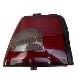 LANTERNA TRASEIRA ESQUERDA TEMPRA 1996 A 1999 BICOLOR