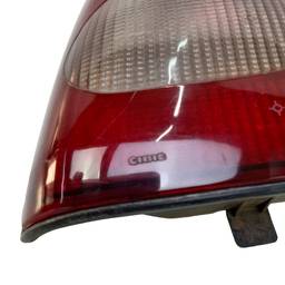 LANTERNA TRASEIRA ESQUERDA TEMPRA 1996 A 1999 BICOLOR