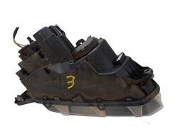 FAROL ESQUERDO AMAROK 2011/ C/ RISCOS NO VIDRO