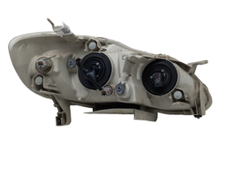 FAROL ESQUERDO COROLLA 2003 A 2004 C/SUPORTE QUEBRADO