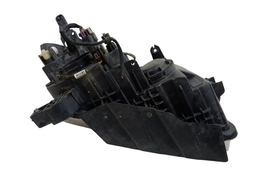 FAROL ESQUERDO TRACKER 2014 A 2016 QUEBRADO