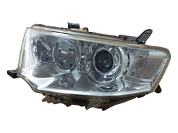 FAROL ESQUERDO TRITON PAJERO DAKAR 2010 A 2018 C/ PROJETOR